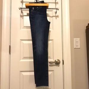 AG “the Prima Ankle” 5 pocket raw hem dark blue wash jeans (size 26R)